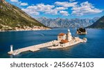 Saint George Island and Church of Our Lady of the Rocks in Perast, Montenegro. Our Lady of the Rock island and Church in Perast on shore of Boka Kotor bay (Boka Kotorska), Montenegro, Europe. 