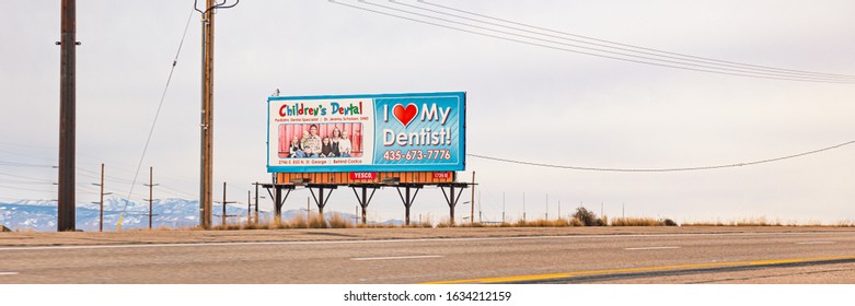 Saint George, UT, USA - January 2020 : Children's Dental Billboard On A Utah Country Road