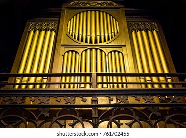 Saint Ives, Cambridgeshire, UK - Circa November 2017: Vertical view of a large, grand church organ seen within an English church, showing detail of the pipework and surrounding structure.