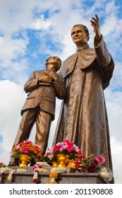Saint John Bosco and Saint Dominic statue.