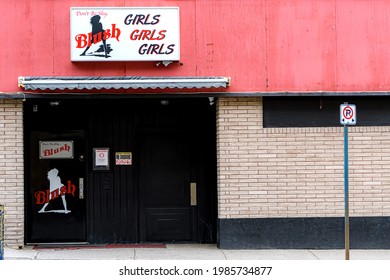 Saint John, NB, Canada - June 3, 2021: The Entrance To Blush, An Exotic Dance Club. The Entry Has Two Black Doors With No Windows, And A Sign Above.