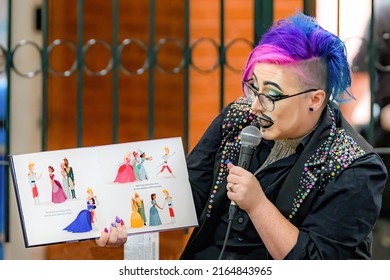 Saint John, NB, Canada - June 5, 2022: A drag king reads children's stories at the Drag Story Hour in Market Square.