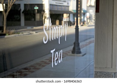 Saint Joseph, Missouri / USA - April 9, 2020 Reflection In A Tea Shop Window