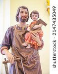 Saint Joseph the worker with Child Jesus catholic religious statue