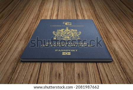 Saint Kitts and Nevis passport on dark brown wooden board, close-up