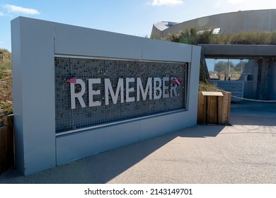 Saint Laurent Sur Mer, Normandy, France - Sep 18, 2019: A sign reading "remember" is shown at Omaha Beach, one of the five D-Day landing beaches involved in Operation Overlord in France.