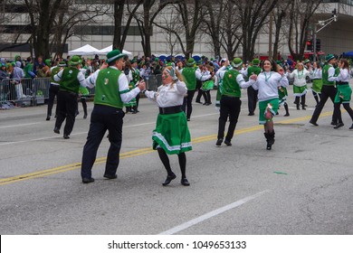 Saint Louis, MO—March 17, 2018, Dancers In Traditional Irish Costumes Dance With Partners In The Street During Saint Patrick’s Day Parade