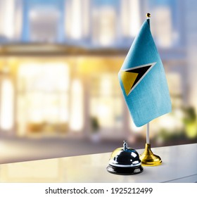 Saint Lucia Flag On The Reception Desk In The Lobby Of The Hotel