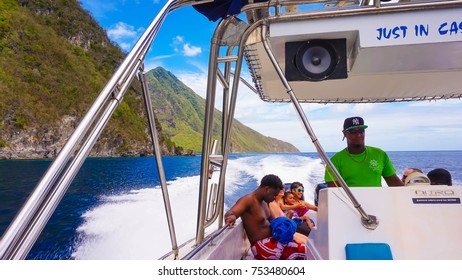 Saint Lucia, Saint Lucia - May 12, 2016: The People Enjoying Of Boat Trip To The Mountains Pitons Near A Beautiful Caribbean Beach At Saint Lucia Island At Caribbean At May 12, 2016