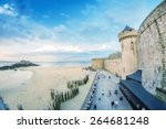 Saint Malo beach and city medieval architecture during Low Tide. Brittany, France, Europe