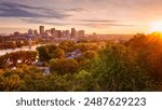 Saint Paul, Minnesota, USA. Aerial cityscape image of downtown St. Paul, Minnesota, USA with reflection of the skyline in Mississippi River at beautiful summer sunrise.