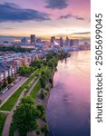 Saint Paul, Minnesota, USA. Aerial cityscape image of downtown St. Paul, Minnesota, USA with reflection of the skyline in Mississippi River at beautiful summer sunrise.