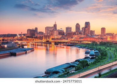 Saint Paul, Minnesota, USA. Aerial cityscape image of downtown St. Paul, Minnesota, USA with reflection of the skyline in Mississippi River at beautiful summer sunset. - Powered by Shutterstock