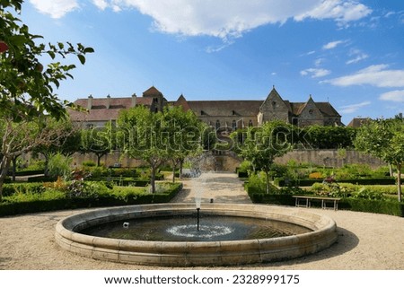 The Saint Peter and Saint Paul church of the Benedictine priory of Souvigny seen from the vegetable garden