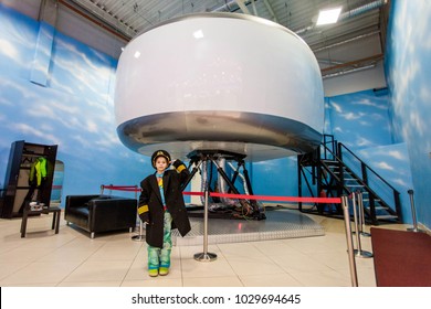 Saint Petersburg / Russia - 03/09/2016: Young Teenage Girl Ready For Pilot Training Simulation Dream Come True