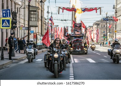 Saint Petersburg, Russia - 05.11.2016: Alexander Zaldostanov (Hirurg), head of accompanied by his fellow bikers, police officers and fire throwing Mad Max monster truck in Saint-Petersburg city centre