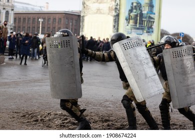 Saint Petersburg, Russia - 31 January 2021: Riot Police Running With Shields. Russia Protest, Illustrative Editorial