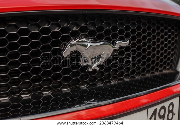 Saint PETERSBURG, Russia -\
August 10, 2021: MUSTANG car emblem and brand logo. A modern and\
high-tech car built by one of the famous American car\
manufacturers.