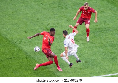 Saint Petersburg, Russia – July 2, 2021. Switzerland Players Denis Zakaria And Silvan Widmer Against Spain Midfielder Koke During EURO 2020 Quarterfinal Switzerland Vs Spain (1-1).