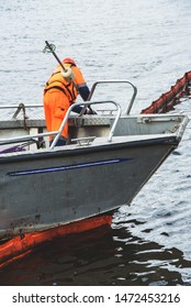 Saint Petersburg, Russia - July 30, 2019: The Doctrine On Liquidation Of Oil Spill In The Sea Port. Rescue Service At Work.