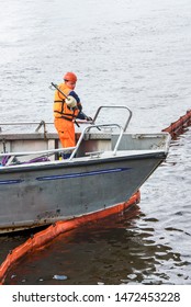 Saint Petersburg, Russia - July 30, 2019: The Doctrine On Liquidation Of Oil Spill In The Sea Port. Rescue Service At Work.