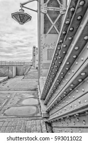 Saint Petersburg, Russia. A Lantern And Constuction Details Of Bolsheokhtinsky Bridge. B/W Image.