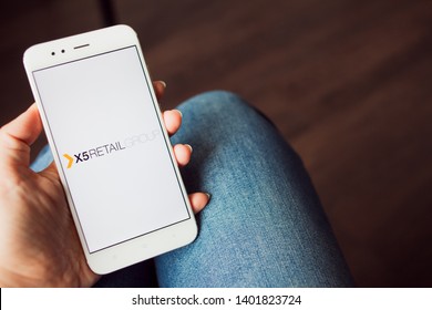 SAINT PETERSBURG, RUSSIA - MAY 14, 2019: Logo of the Russian company X5 retail Group on the smartphone screen. Russian business, Illustrative editorial
