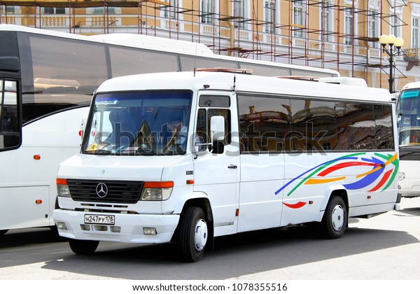 Saint\
Petersburg, Russia - May 25, 2013: White city sightseeing coach bus\
Mercedes-Benz 814D Vario in the city\
street.