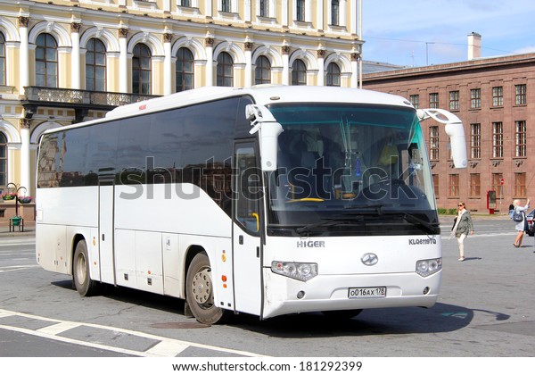 SAINT PETERSBURG, RUSSIA - MAY\
25, 2013: White Higer KLQ6119TQ interurban coach at the city\
street.