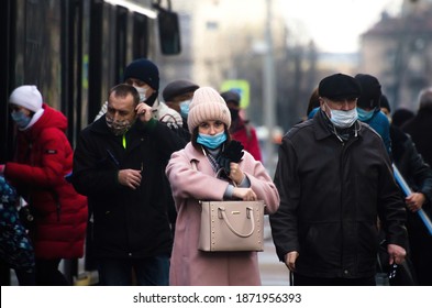 Saint Petersburg, Russia - November 21 2020:
COVID-19 Pandemic In Russia. A Crowd Of People With And Without Mask. Coronavirus Safety Neglections