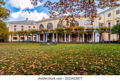 Saint Petersburg, Russia - October 2022: Pavlovsk Palace And Flying Mercuty Sculpture In Autumn Pavlovsky Park