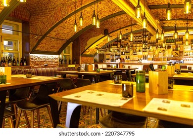 Saint Petersburg, Russia - September 05, 2022: Interior Of Cozy Modern Restaurant With A Bar Counter And Lamp Lighting