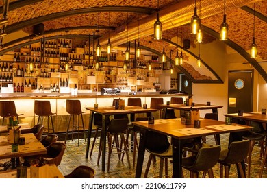 Saint Petersburg, Russia - September 05, 2022: Interior Of Cozy Modern Restaurant With A Bar Counter And Lamp Lighting