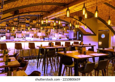 Saint Petersburg, Russia - September 05, 2022: Interior Of Cozy Modern Restaurant With A Bar Counter And Lamp Lighting