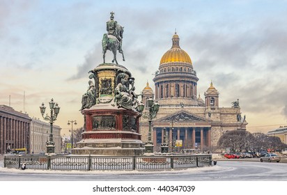 Saint Petersburg, Russia. St. Isaac Cathedral And  The Monument To Nicholas I In The Snow. Shot From The Back Of The Monument.