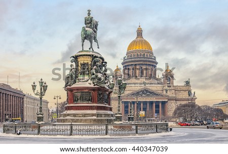 Saint Petersburg, Russia. St. Isaac cathedral and  The Monument to Nicholas I in the snow. Shot from the back of the monument.