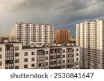 Saint Petersburg, Russia.  View from the window to multi-storey modern residential building at on the right bank of the Neva and raibow in the sky