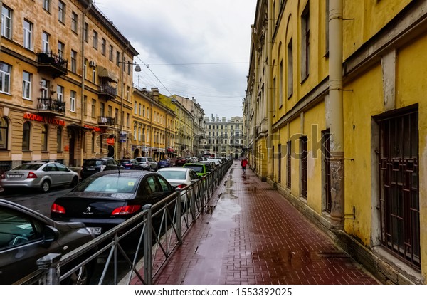 Saint Petersburg street panorama with historic\
buildings, architecture and pedestrians. Saint Petersburg, Russia\
June 29, 2019.