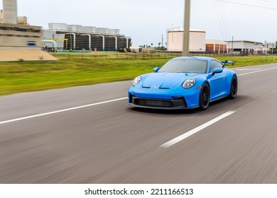 SAINT PETERSBURG, UNITED STATES - Jun 05, 2022: A Modern Blue Porsche 911 GT3 Sportscar In Motion