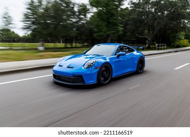 SAINT PETERSBURG, UNITED STATES - Jun 05, 2022: A Modern Blue Porsche 911 GT3 Sportscar In Motion