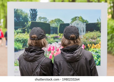 Saint Petersburg-Russia-09.05.2000: Visitors To A Street Art Exhibition. Twins.