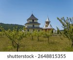 The Saint Prophet Elijah Hermitage in the village of Salas, spread out on a gentle mountain peak in Obcina Brodina, Romania