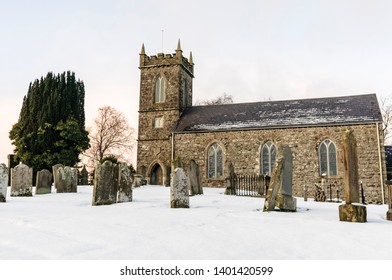 Saint Saviour's Church of Ireland, Kells, and graveyard covered in snow