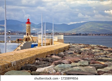 Saint Tropez, French Riviera. Lighthouse And Breakwater Of Saint Tropez Harbor, Alpes-Maritimes Department In Southern France
