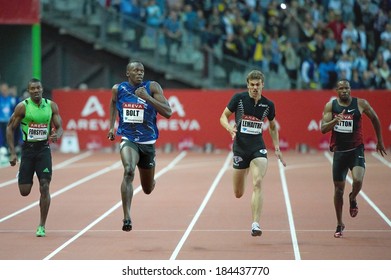 SAINT-DENIS, FRANCE - JULY 8, 2011 - Usain Bolt and Christophe Lemaitre (center) running 200 meters at meeting Areva with Maryo Forsythe (left) and Darvis Patton (right)  