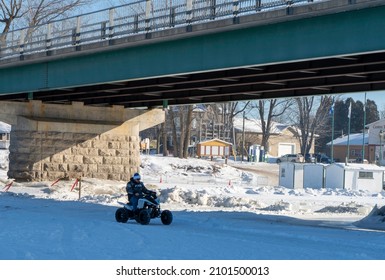 Sainte Anne De La Parade, Quebec  Canada - December 29 2021: A Makeshift Ice Fishing Community Forms On Riviere Sainte-Anne, Complete With Cabins, Rinks, Electricity, Shops, And Play Areas For Kids.