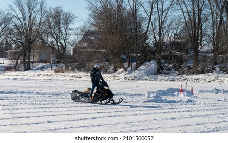 Sainte Anne De La Parade, Quebec  Canada - December 29 2021: A Makeshift Ice Fishing Community Forms On Riviere Sainte-Anne, Complete With Cabins, Rinks, Electricity, Shops, And Play Areas For Kids.