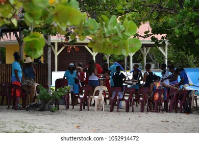 Sainte Luce, Martinique -10-12-2015: Young People Drumming On The Beach, Caribbean Steel Drum Music