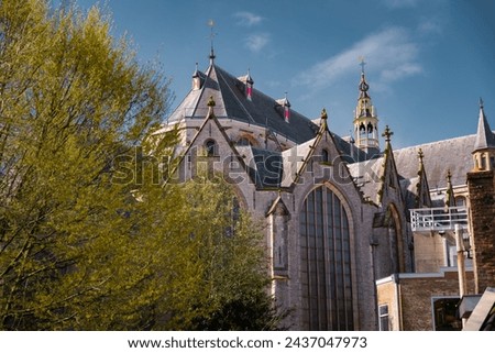 The Saint-John church in Gouda, the Netherlands. Details of large Gothic church on a sunny day