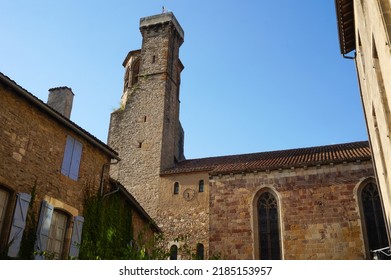 Saint-Michel's Church of Cordes-sur-Ciel, in the South of France ; this medieval church features a stone, fortified belfry flanked with a stone watch tower built in the 14th century, and a tiled roof